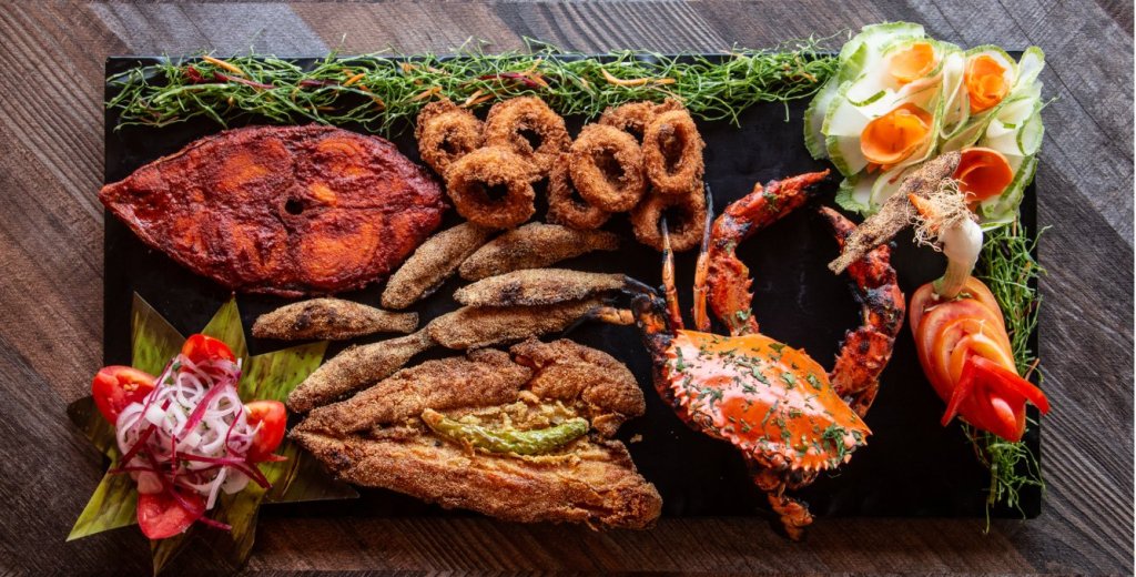 A delicious seafood platter served at a beachside restaurant in Goa.
