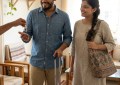 Couple checking into a cozy homestay room with natural window light, simple decor, realistic travel setting, warm and ho
